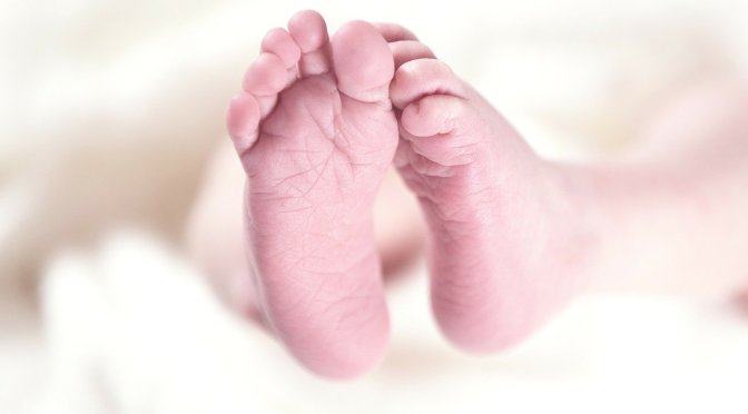 two infant feet