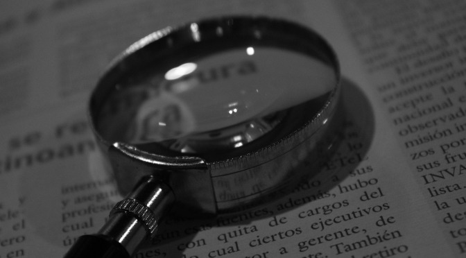 magnifying glass and text